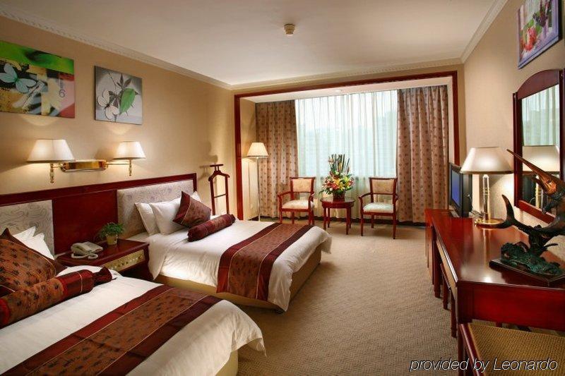 Xiamen Huaqiao Hotel Quarto foto